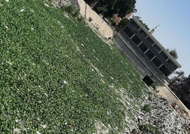  ترعة كفر السواقي تهدد صحة السكان بسبب “القمامة”